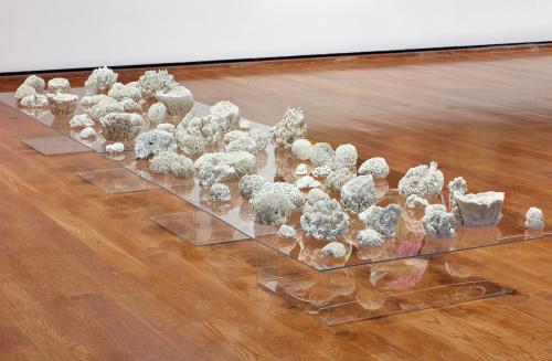 “Biota,” 2012, Porcelain, silver-leaf rapid prototype figurines, Plexiglas sheets, Overall dimensions:  4 × 16 × 20 inches