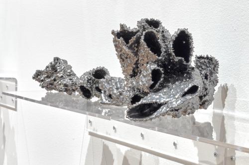 “Carbon Collision of the Diamond Mind,” 2013,  Metallic-Glazed Porcelain, Plexiglas Shelves