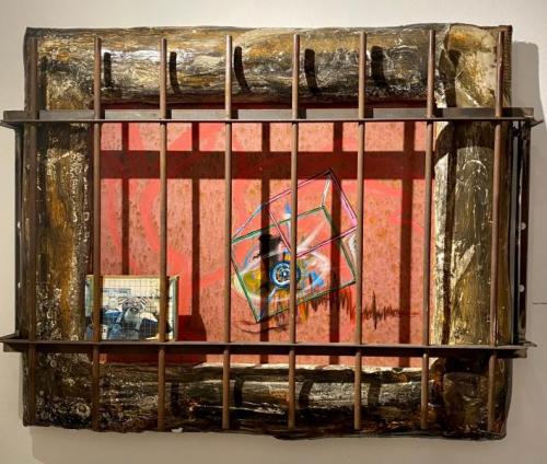  “Creativity Imprisoned,” 2010, Acrylic on Canvas, Plaster, Photograph, Metal Grate, 33 x 41.5 x 6 Inches 
