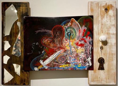 “Madness,” 2010, Acrylic on Canvas with Frame of White Pine, Mirror Fragments, Door Knocker, Handle, 34 x 46 x 5 Inches 