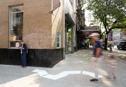"Dispersed Geographies," 2024, cut white vinyl silouehettes adhered to concrete, various locations in New York City, NY